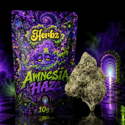 Balení Herbz Amnesia Haze s barevným designem inspirovaným haze